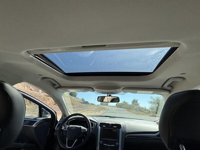 Photo of 2014 Sterling Gray Metallic Ford Fusion Hybrid
