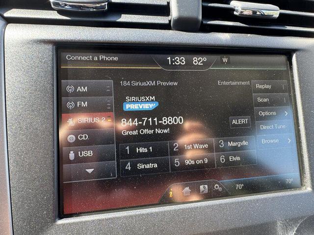 Photo of 2014 Sterling Gray Metallic Ford Fusion Hybrid