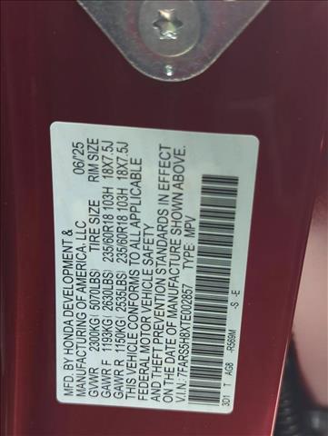 Photo of 2026 Radiant Red Metallic Honda CR-V Hybrid