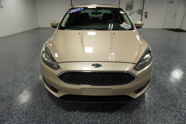 Photo of 2017 White Gold Metallic Ford Focus