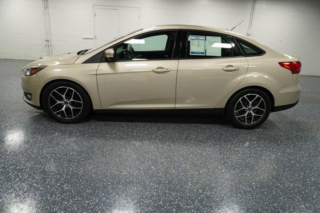 Photo of 2017 White Gold Metallic Ford Focus