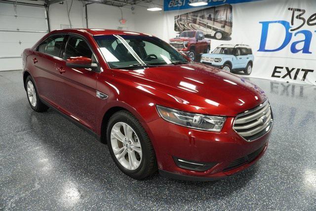 Photo of 2016 Ruby Red Ford Taurus
