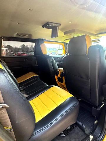 Photo of 2003 Yellow Hummer H2