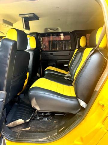 Photo of 2003 Yellow Hummer H2