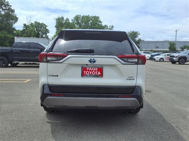 Photo of 2019 Blizzard Pearl w/Black Roof Toyota RAV4 Hybrid