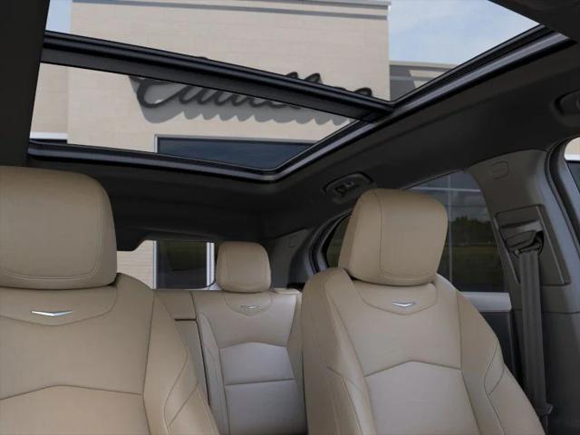Photo of 2025 Crystal White Tricoat Cadillac XT4