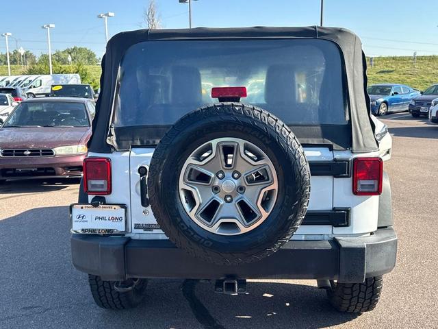 Photo of 2018 Bright White Clearcoat Jeep Wrangler JK