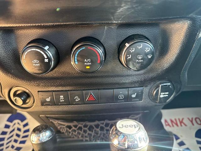 Photo of 2018 Bright White Clearcoat Jeep Wrangler JK