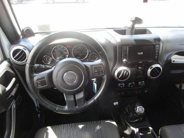 Photo of 2012 Bright White Clearcoat Jeep Wrangler Unlimited