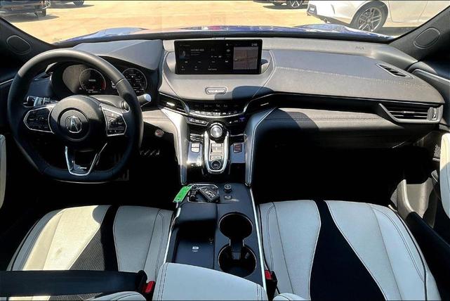 Photo of 2025 Apex Blue Pearl Acura TLX