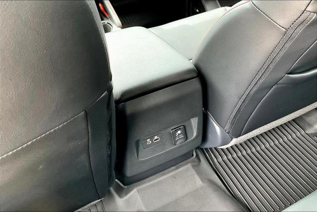 Photo of 2024 Cardinal Red Metallic Nissan Frontier