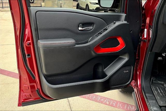 Photo of 2024 Cardinal Red Metallic Nissan Frontier