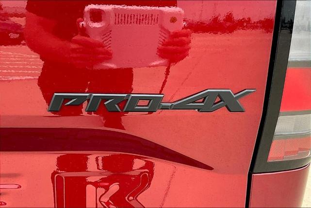 Photo of 2024 Cardinal Red Metallic Nissan Frontier