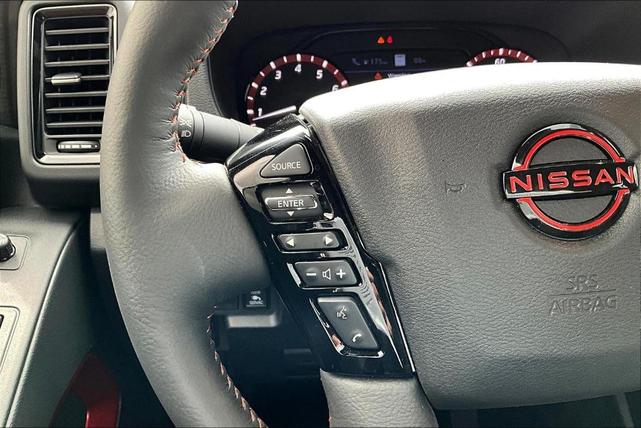 Photo of 2024 Cardinal Red Metallic Nissan Frontier