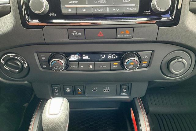 Photo of 2024 Cardinal Red Metallic Nissan Frontier