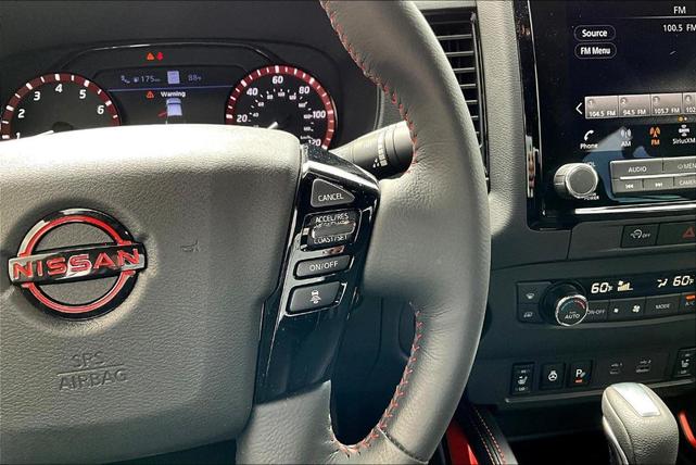 Photo of 2024 Cardinal Red Metallic Nissan Frontier