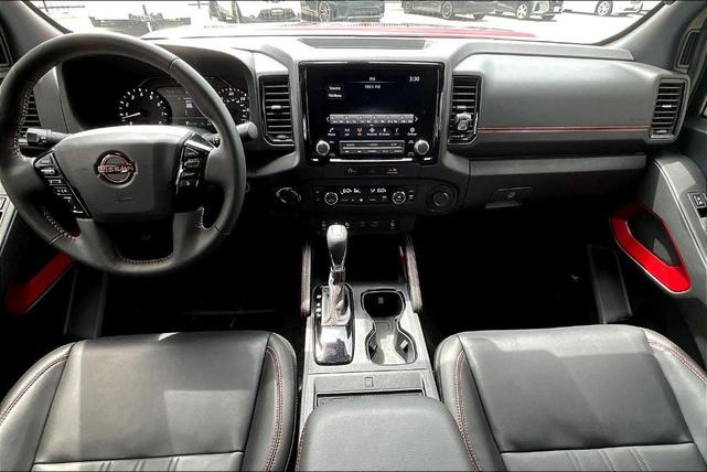 Photo of 2024 Cardinal Red Metallic Nissan Frontier