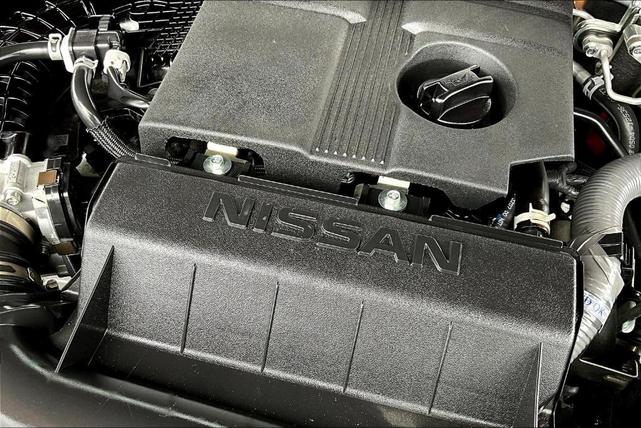 Photo of 2024 Cardinal Red Metallic Nissan Frontier