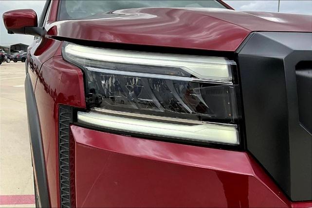 Photo of 2024 Cardinal Red Metallic Nissan Frontier