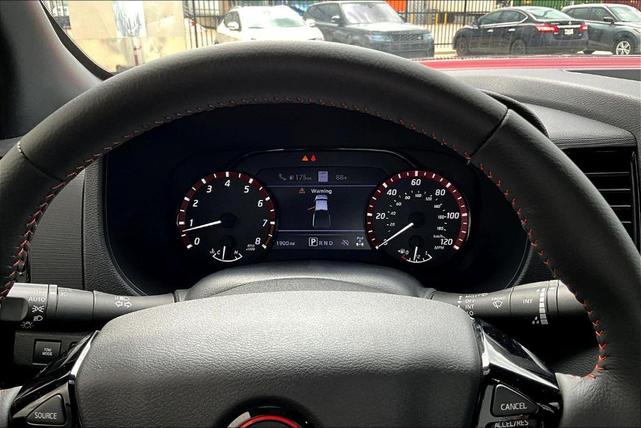 Photo of 2024 Cardinal Red Metallic Nissan Frontier