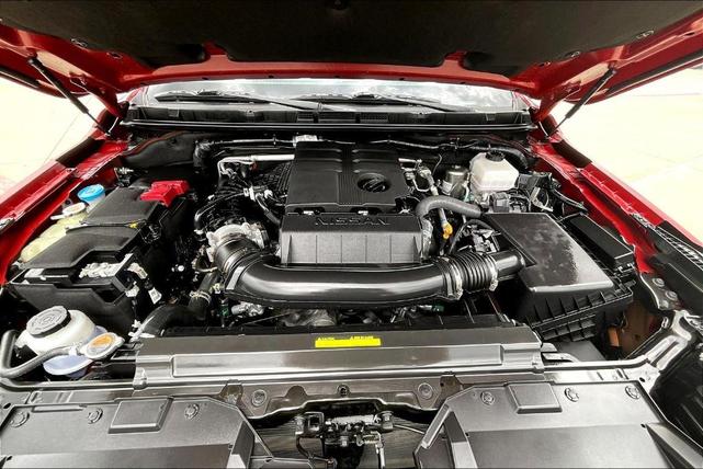 Photo of 2024 Cardinal Red Metallic Nissan Frontier