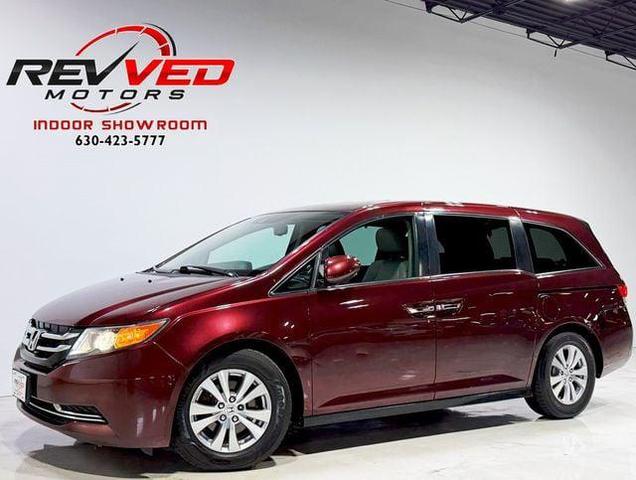 Photo of 2015 Dark Cherry Pearl Honda Odyssey