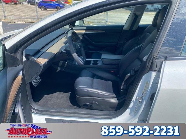 Photo of 2023 Pearl White Multi Tesla Model 3