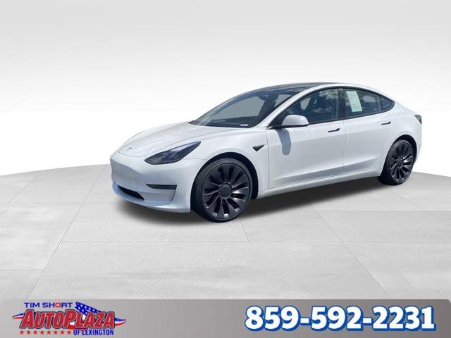 Photo of 2023 Pearl White Multi Tesla Model 3