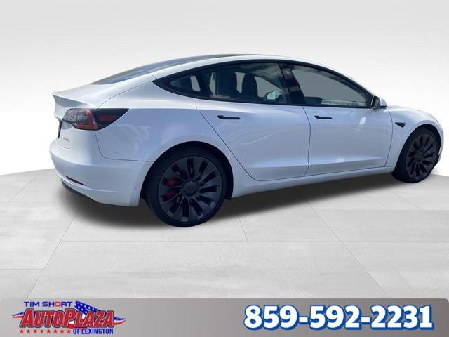 Photo of 2023 Pearl White Multi Tesla Model 3