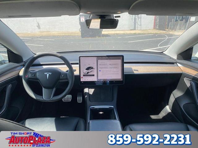 Photo of 2023 Pearl White Multi Tesla Model 3