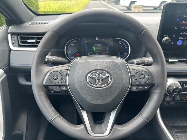 Photo of 2024 White Toyota RAV4 Hybrid