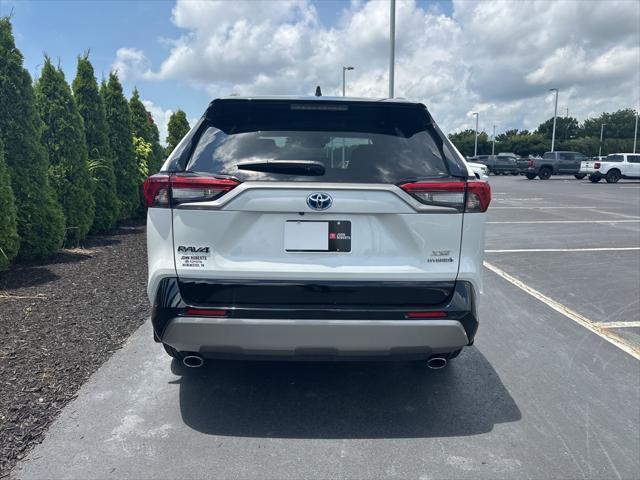 Photo of 2024 White Toyota RAV4 Hybrid
