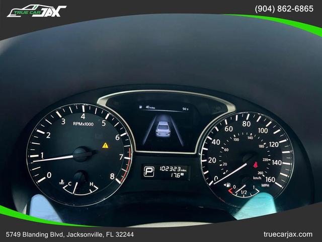 Photo of 2014 Pearl White Nissan Altima