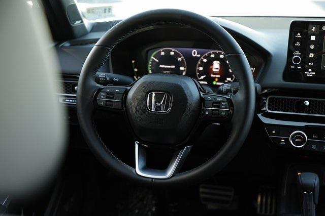 Photo of 2025 Platinum White Honda Civic Hybrid