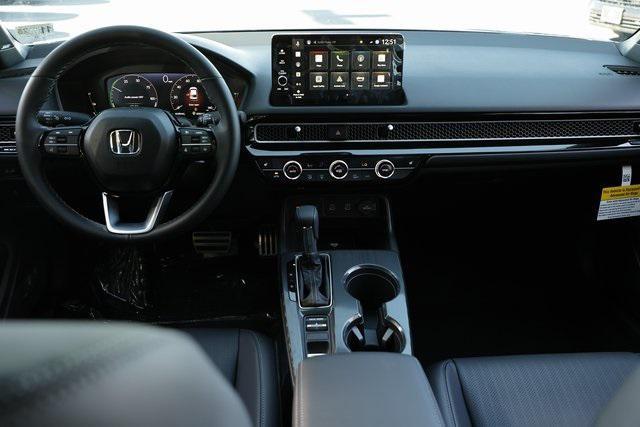 Photo of 2025 Platinum White Honda Civic Hybrid
