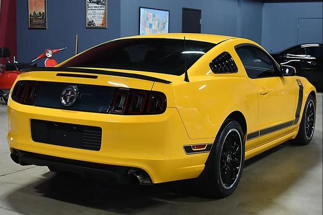Photo of 2013 School Bus Yellow Ford Mustang