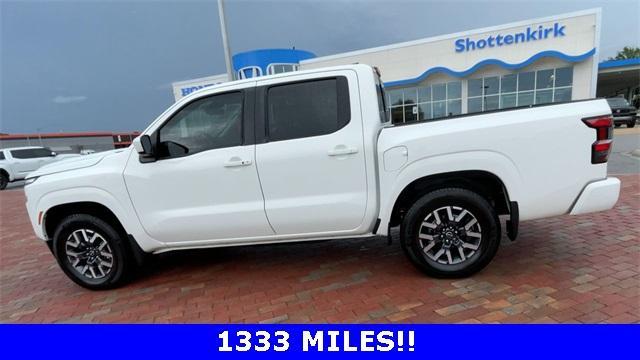 Photo of 2024 Glacier White Nissan Frontier