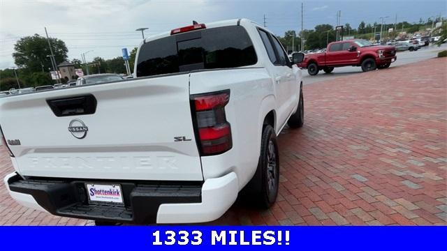 Photo of 2024 Glacier White Nissan Frontier