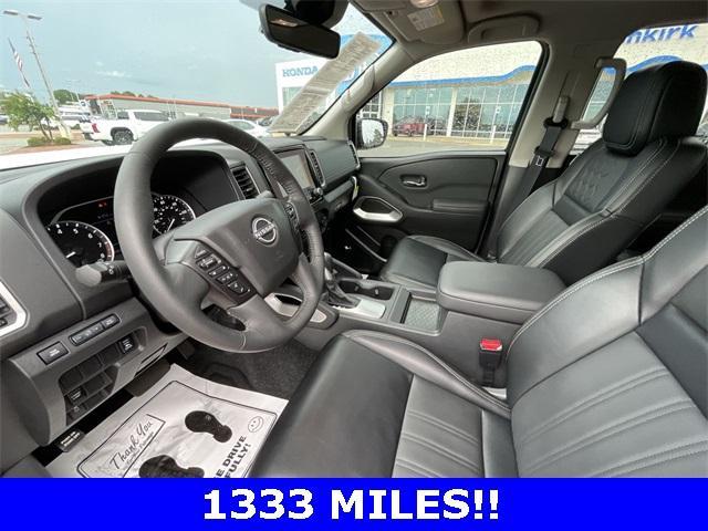 Photo of 2024 Glacier White Nissan Frontier