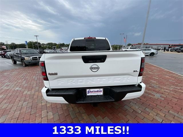 Photo of 2024 Glacier White Nissan Frontier