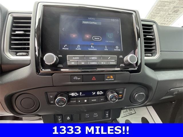 Photo of 2024 Glacier White Nissan Frontier
