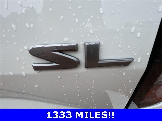 Photo of 2024 Glacier White Nissan Frontier