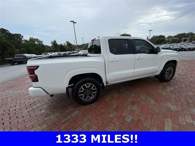 Photo of 2024 Glacier White Nissan Frontier