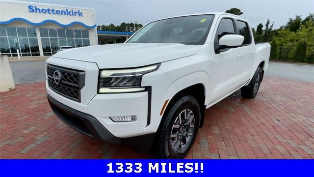 Photo of 2024 Glacier White Nissan Frontier
