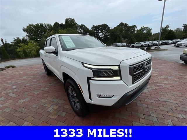 Photo of 2024 Glacier White Nissan Frontier