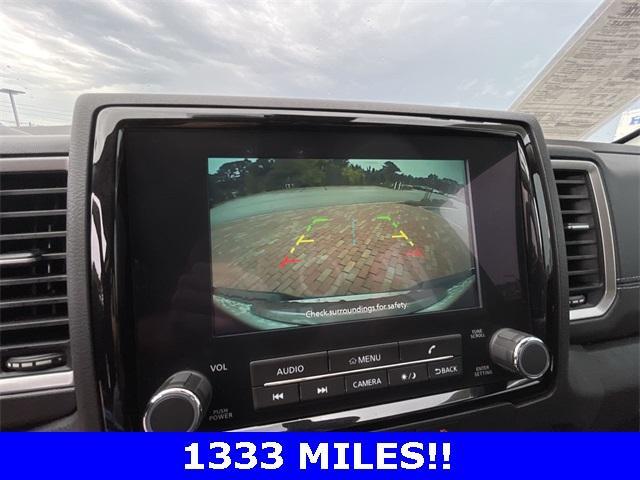 Photo of 2024 Glacier White Nissan Frontier