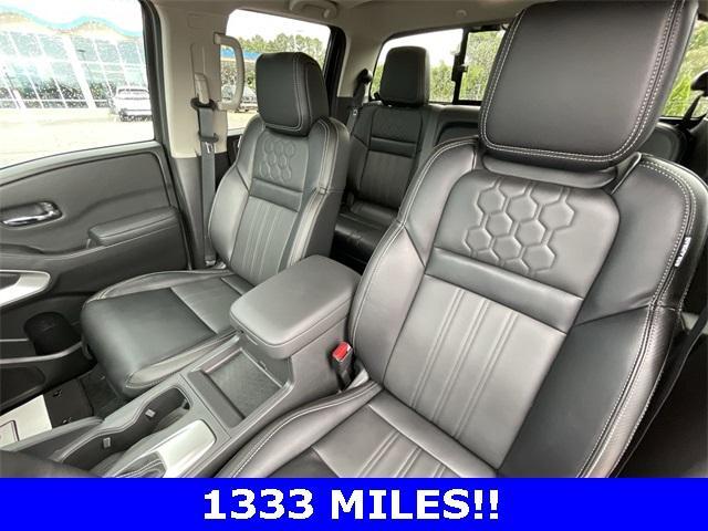 Photo of 2024 Glacier White Nissan Frontier
