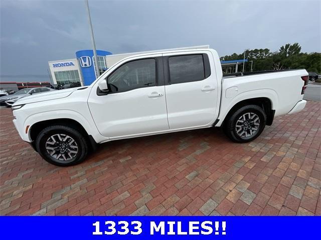 Photo of 2024 Glacier White Nissan Frontier
