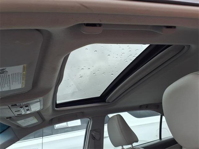 Photo of 2012 Classic Silver Metallic Toyota Camry Hybrid