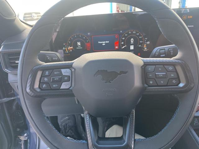 Photo of 2025 Blue Ember Metallic Ford Mustang